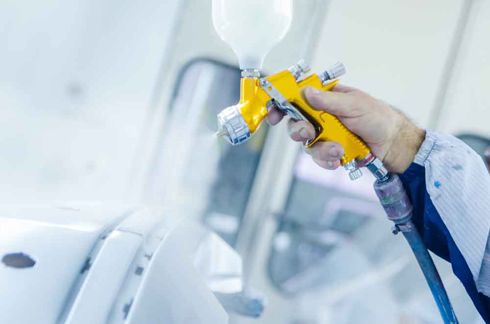 Rockville Certified Auto Body Repair – Painting Bumper In Booth Rockville Certified Auto Body Repair - Painting Bumper In Booth